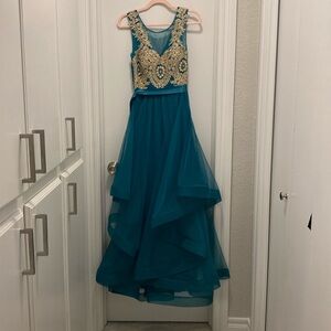 Jodi Kristopher formal prom dress with emerald green and gold detailing